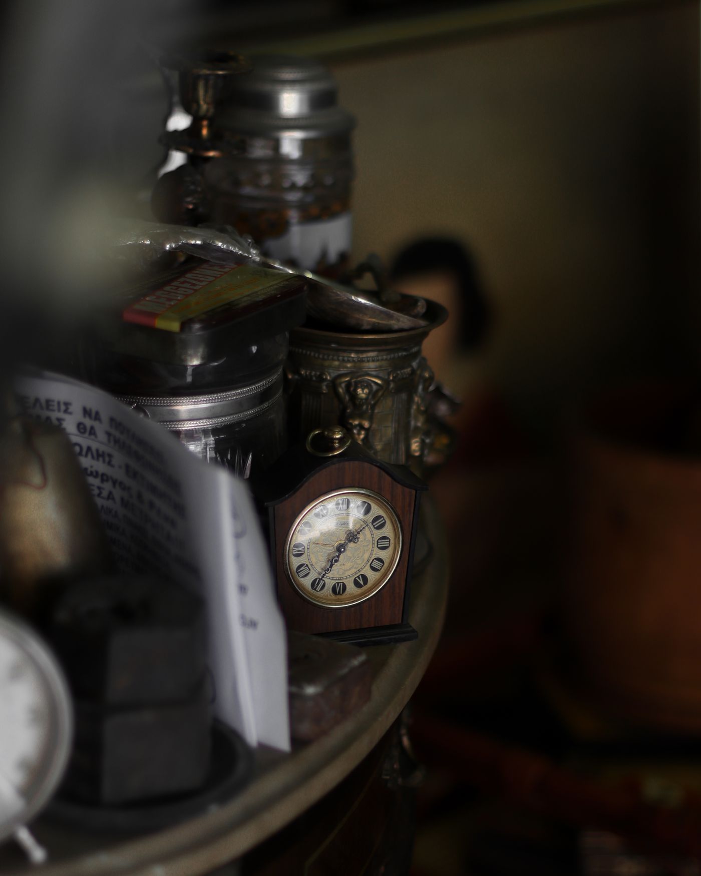 A vintage clock, illustrating the chronology of two overlapping novels.