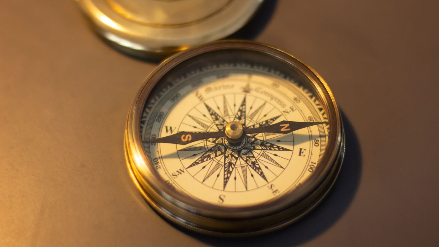 A vintage brass compass in close-up, a thematic photograph for Davos Seaworth.