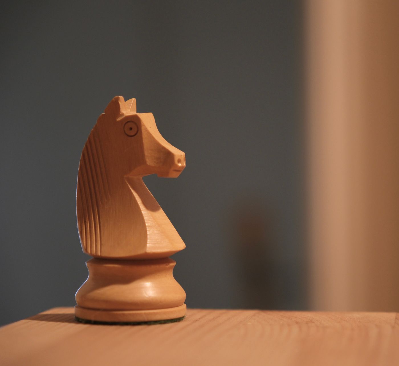 A carved wooden chess knight, a thematic image for Robb Stark’s military victories.