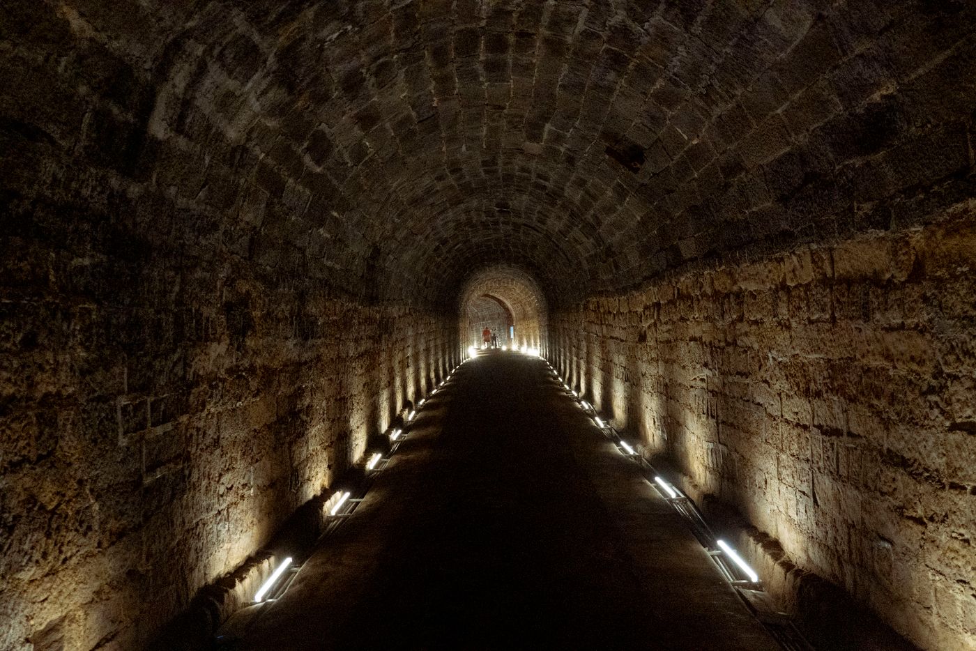 A dim stone corridor below ground, a thematic photograph for Winterfell’s crypts.